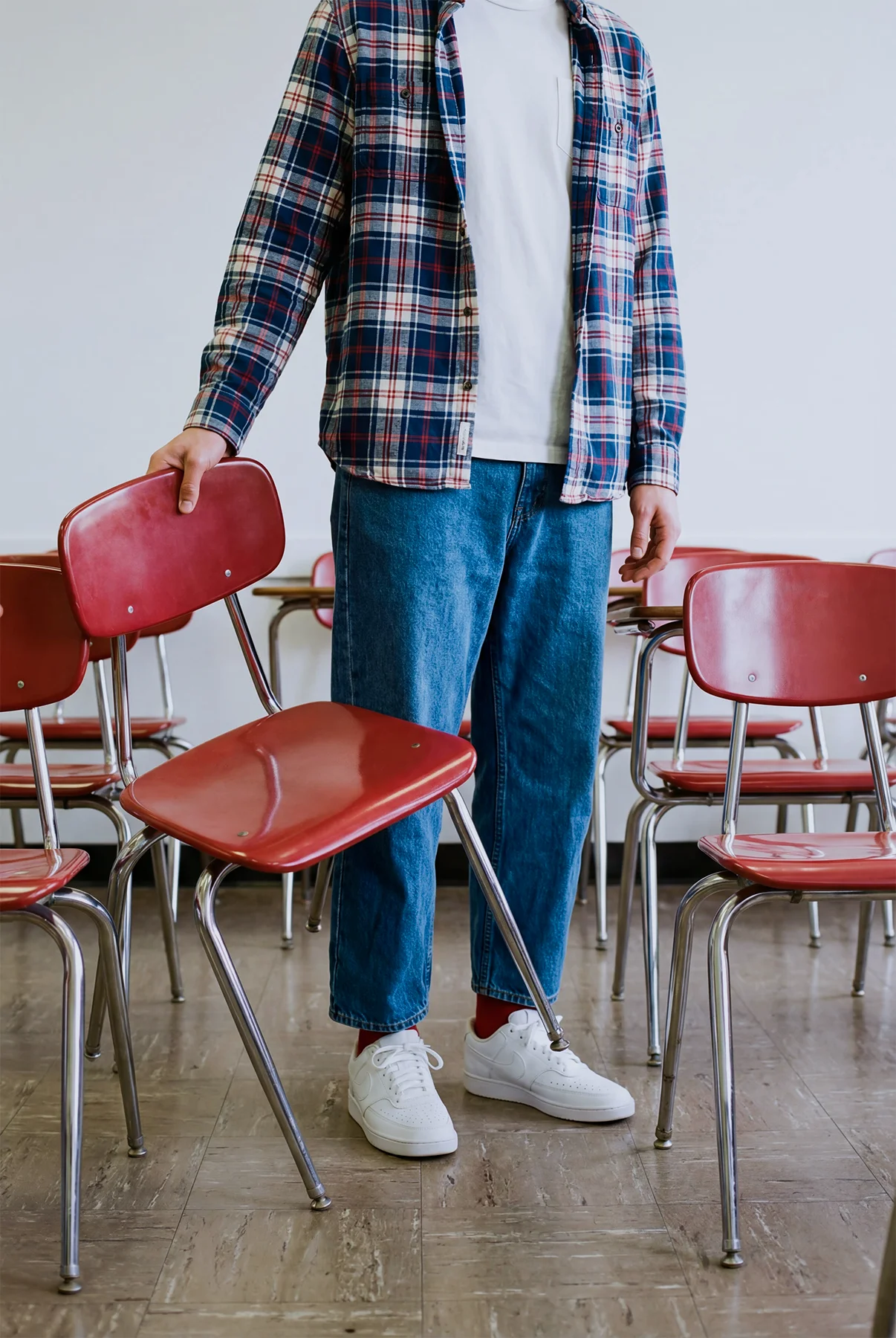 simone-breker-hiring-man-with-chair simone-breker-hiring-man-with-chair